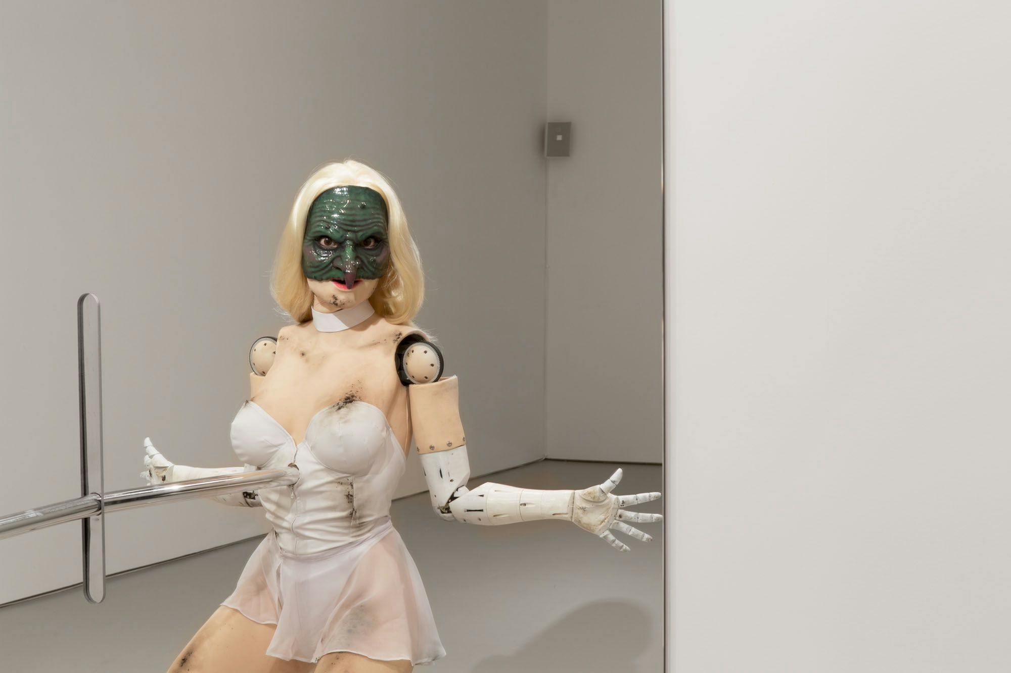 An installation view featuring a sculpture by Jordan Wolfson, titled (Female figure), dated 2014