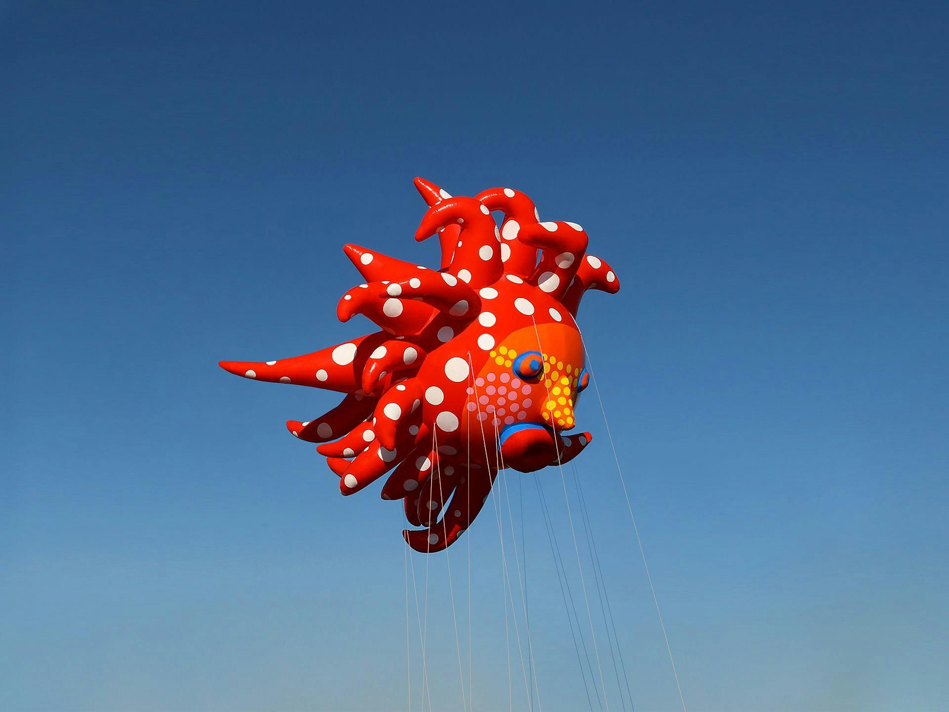 A Macy's Thanksgiving Day Parade balloon by Yayoi Kusama, titled Love Flies Up to the Sky, dated 2020