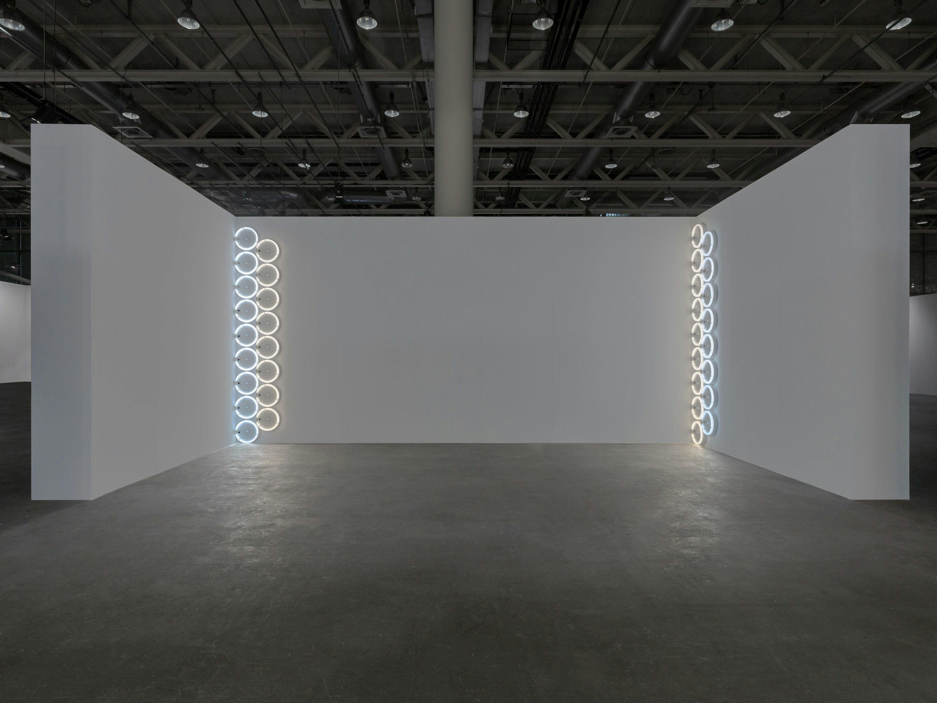 Installation view of Dan Flavin's untitled (to Tina and Christoph and their Palladio) at Art Basel Unlimited, dated 2024.