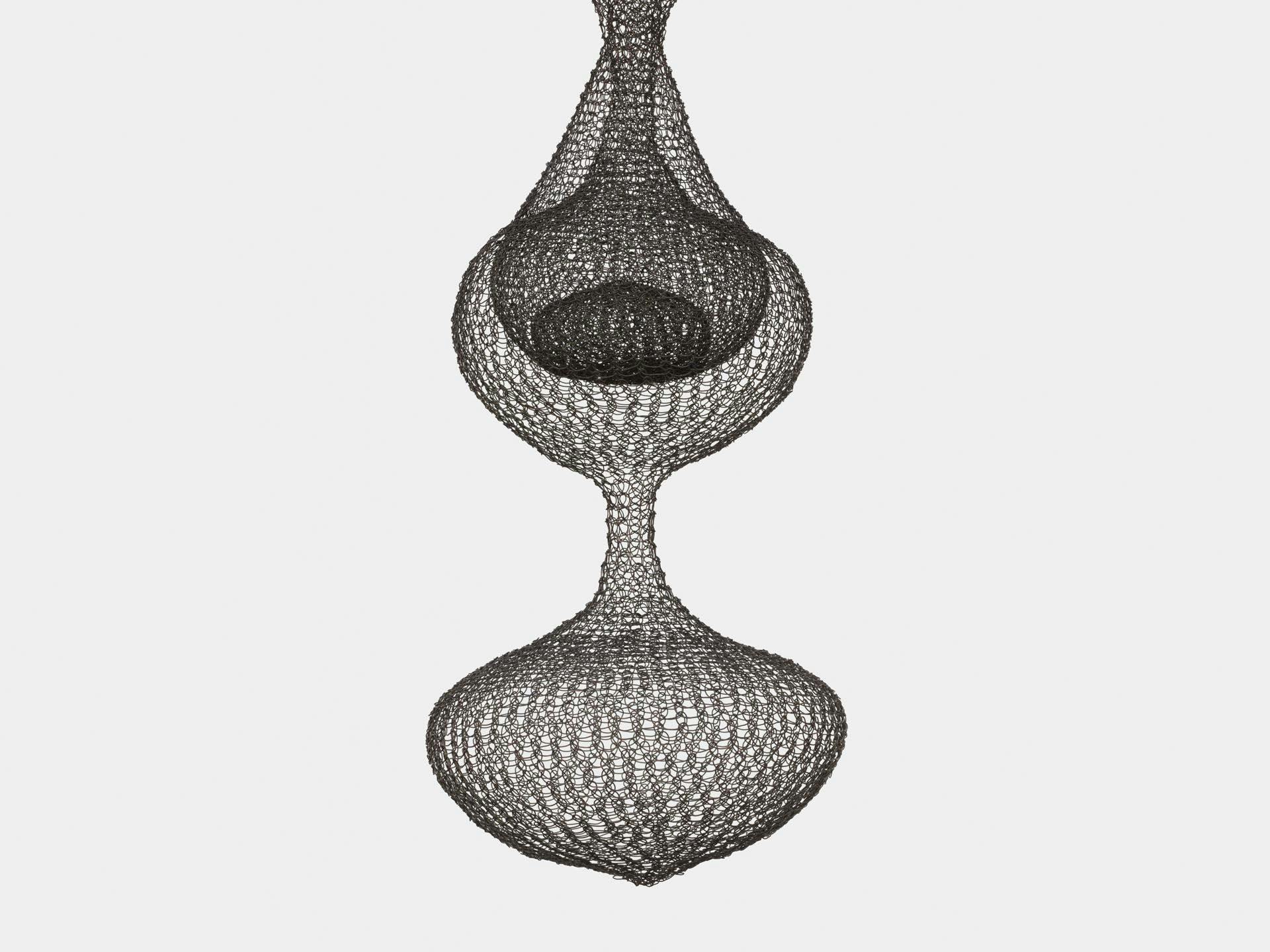 A detail of a sculpture by Ruth Asawa, titled Untitled (S.272, Hanging Seven-Lobed, Continuous Interwoven Form, with Spheres within Two Lobes), dated  circa 1954.