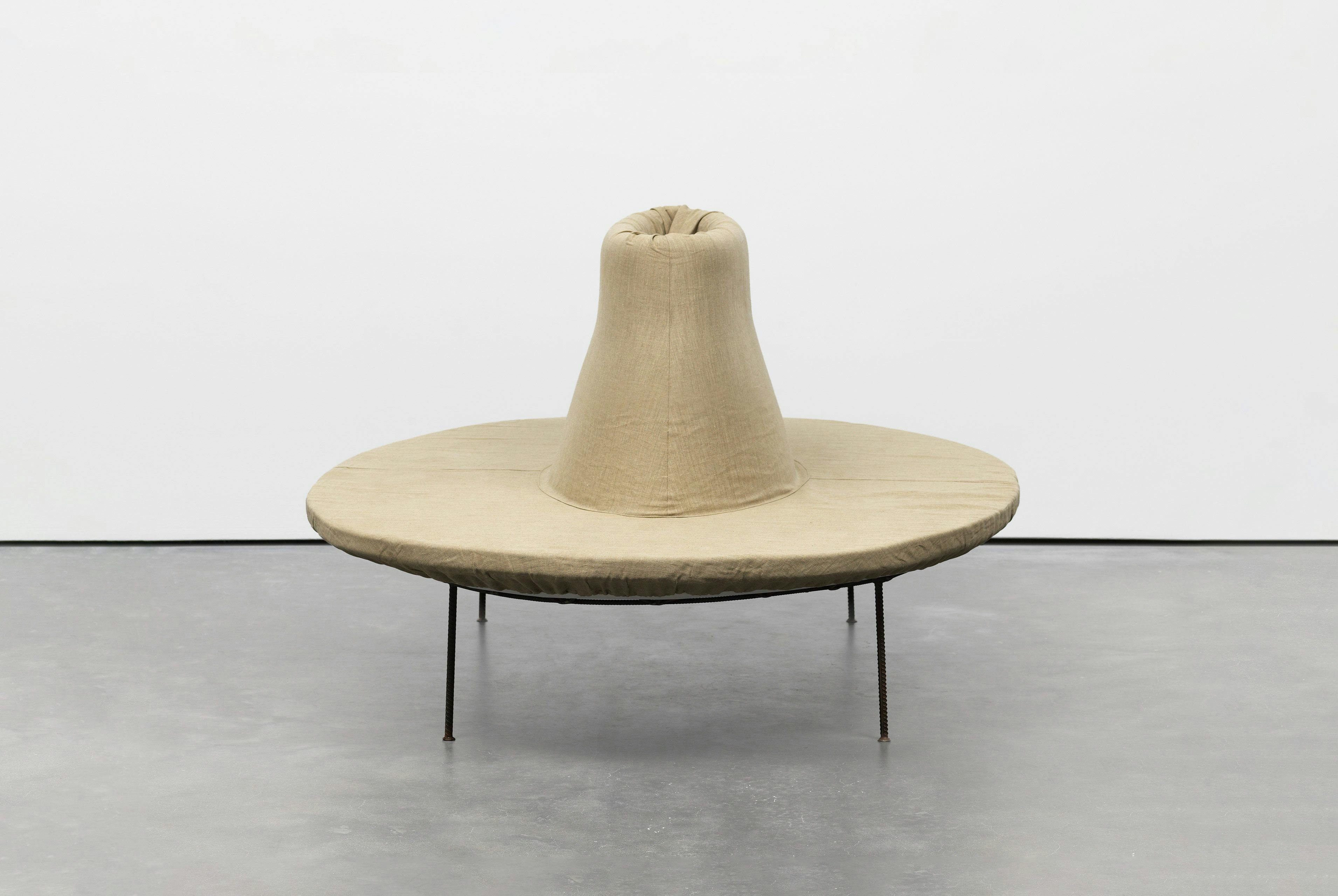 A piece of furniture by Franz West, titled Pouf, dated 2000.