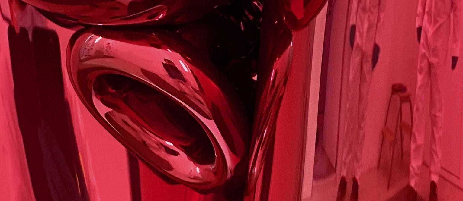 A detail from a sculpture by Jeff Koons, titled Balloon Venus Lespugue (Red), dated 2013–2019.
