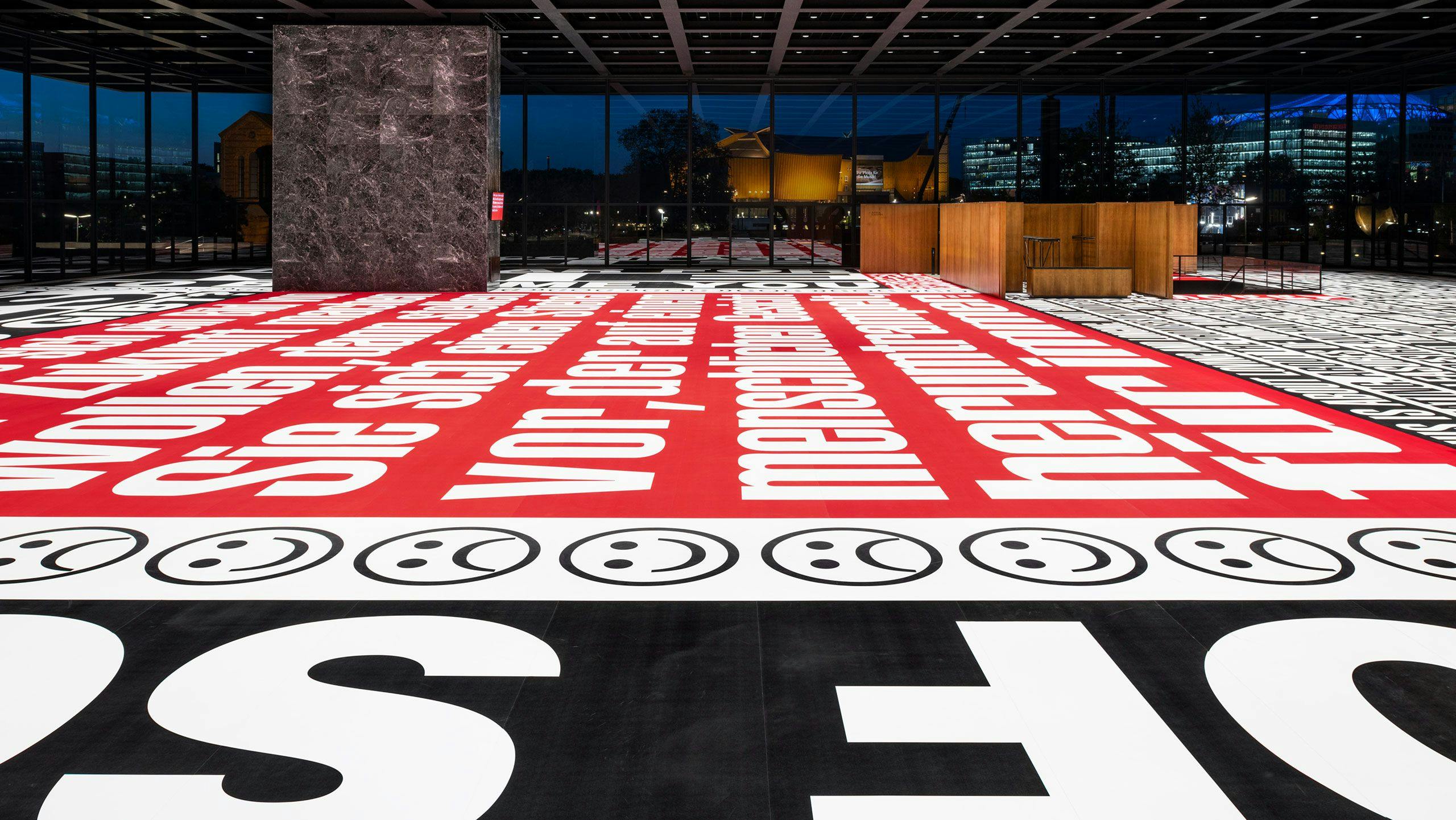 Installation view of the exhibition, Barbara Kruger: Bitte lachen / Please cry, at Neue Nationalgalerie in Berlin, dated 2022.