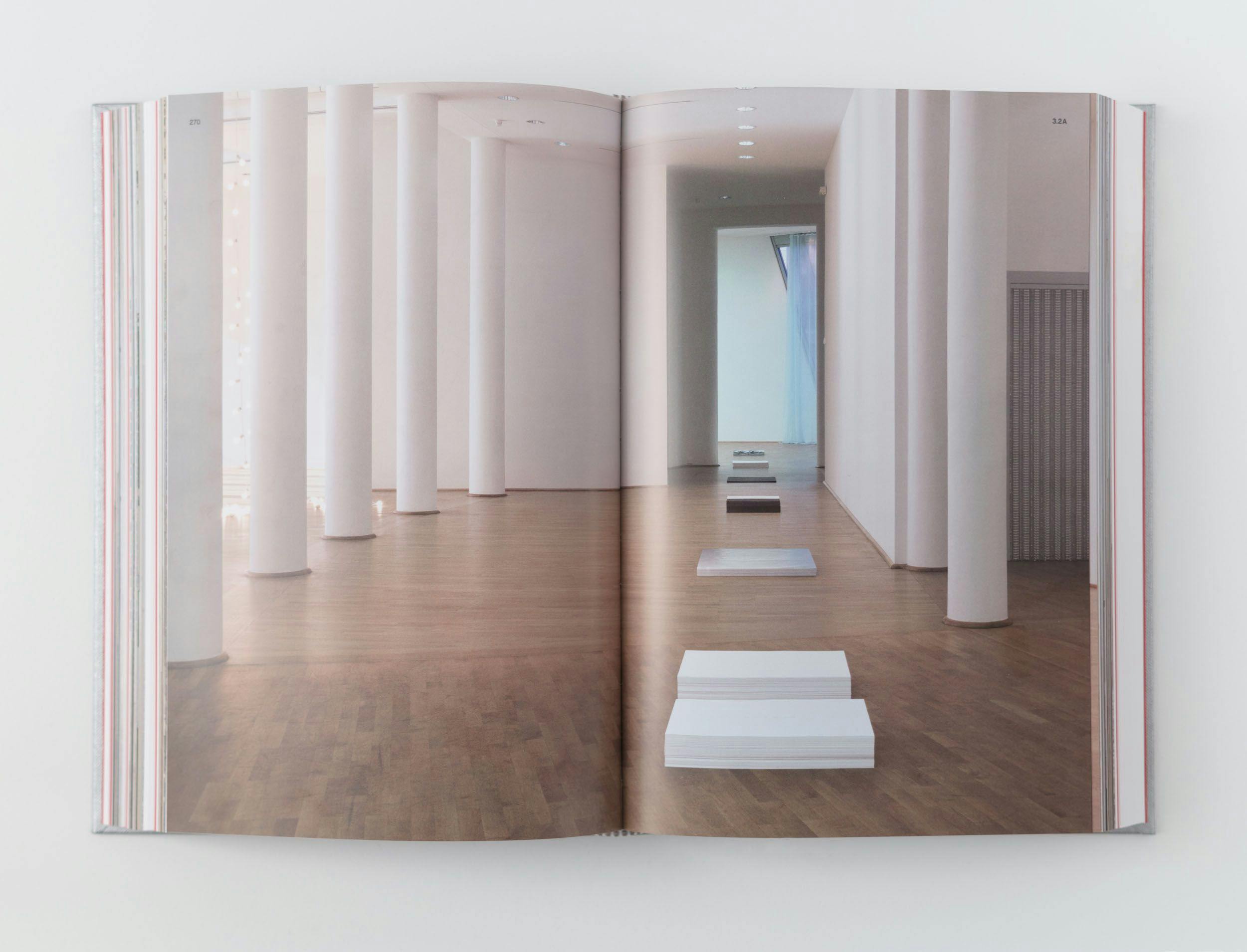 A photograph of a spread from the book Felix Gonzalez-Torres: Specific Objects Without Specific Form, dated 2016.