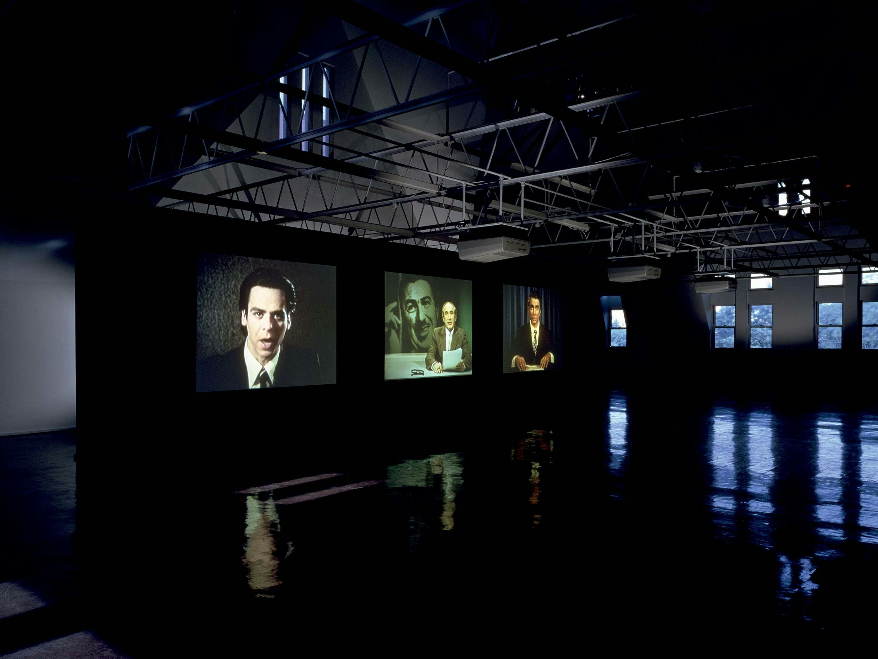 A video installation by Stan Douglas, titled Evening, dated 1994.