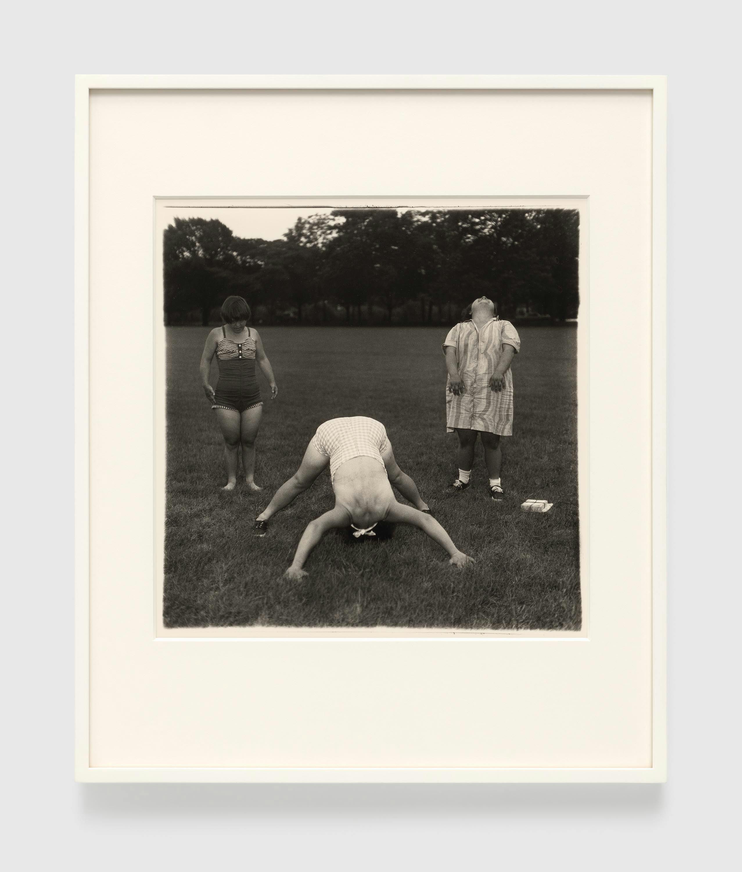 A gelatin silver print by Diane Arbus, titled Untitled (6) 1970-71, dated 1970-1971.